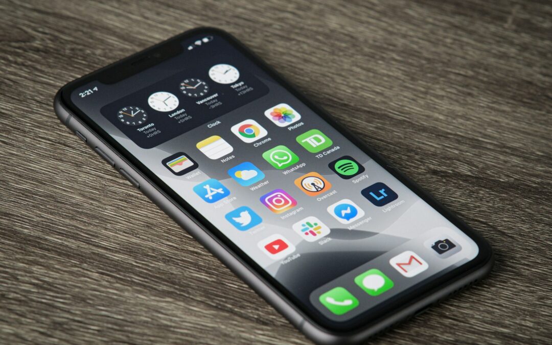 A smartphone home screen full of app icons, like the pile of AI subscriptions many small businesses pay for